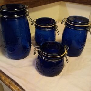 A set of four colbert blue Mason jars.